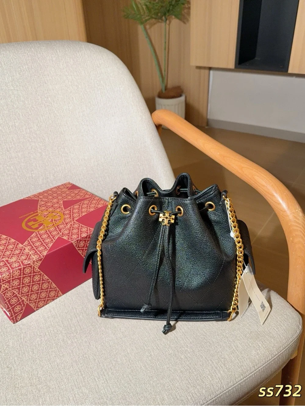 Tory Burch Black Pebbled Leather Drawstring Bucket Bag with Gold Chain